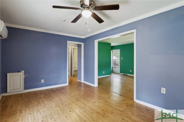 unfurnished room featuring ceiling fan and light hardwood / wood-style flooring