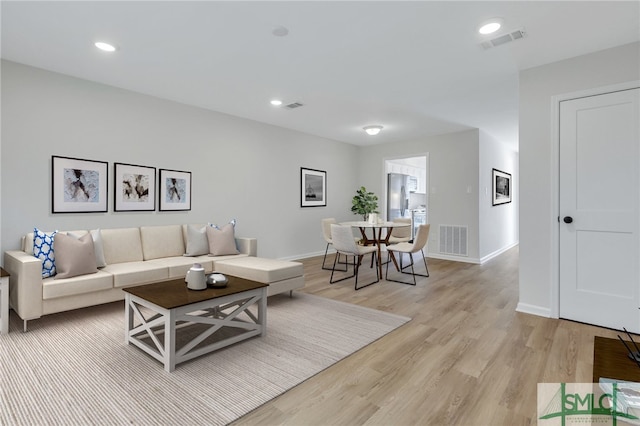 living room with light wood-type flooring