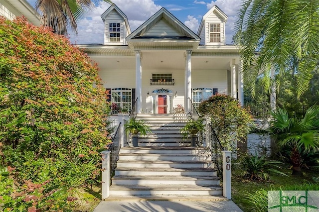 doorway to property with covered porch