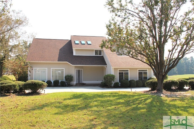 view of front of home with a front yard