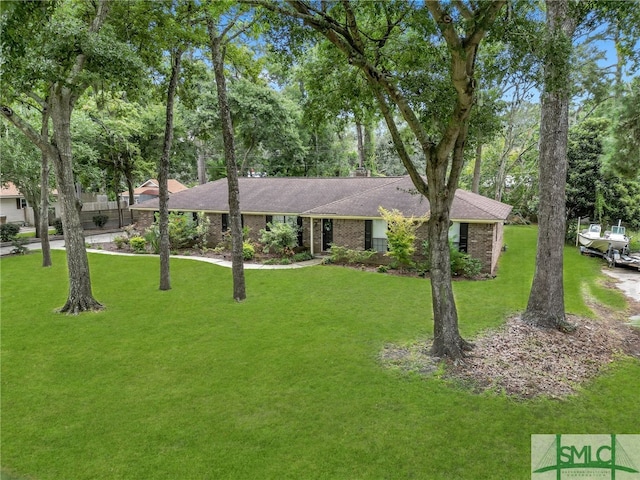 ranch-style house with a front yard