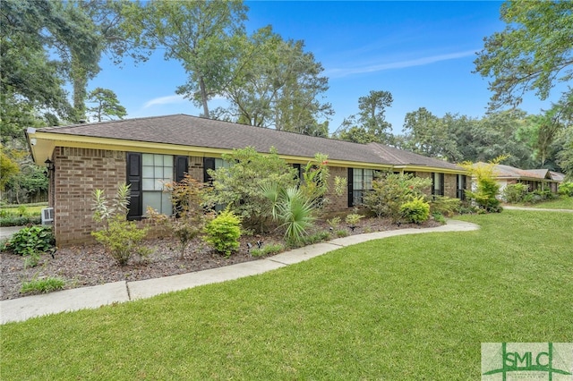 ranch-style home with a front yard