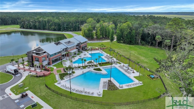 birds eye view of property with a water view