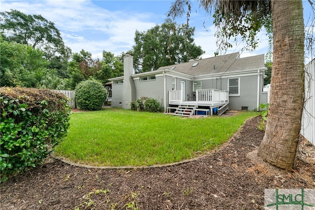 view of yard featuring a deck