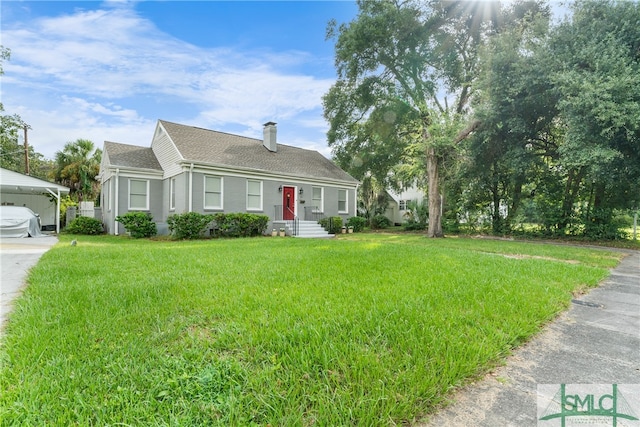 view of front facade featuring a garage and a front lawn