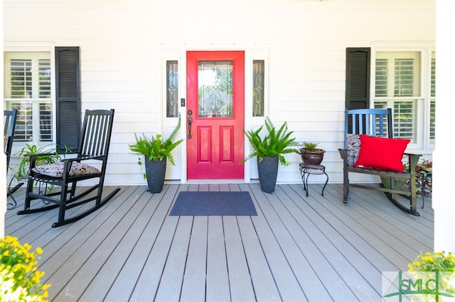 doorway to property featuring a deck