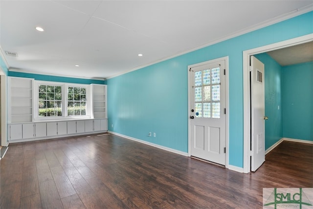 unfurnished living room with ornamental molding, dark wood-type flooring, and a wealth of natural light