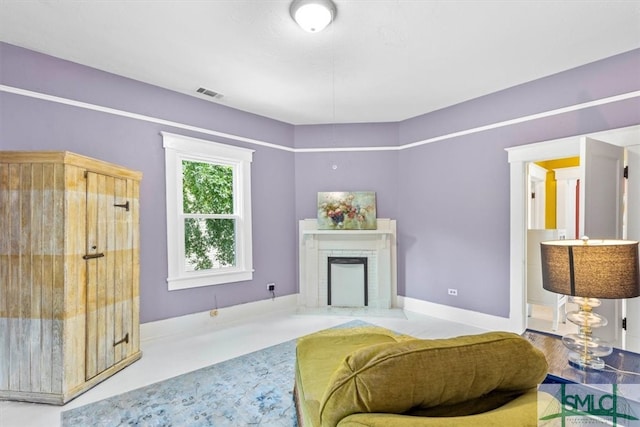 interior space with a brick fireplace