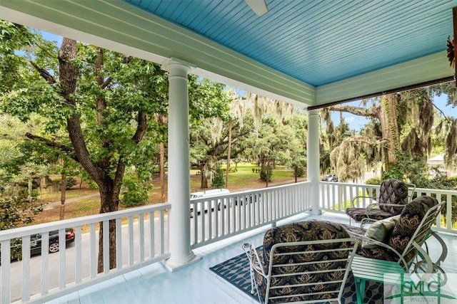 wooden deck with a porch