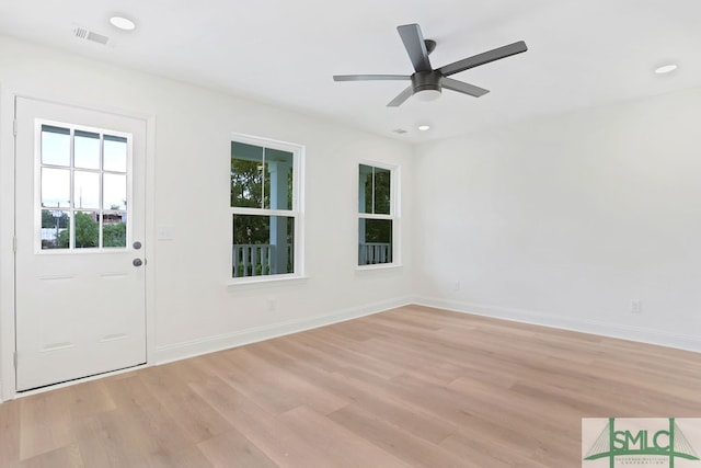 interior space featuring light hardwood / wood-style floors and ceiling fan