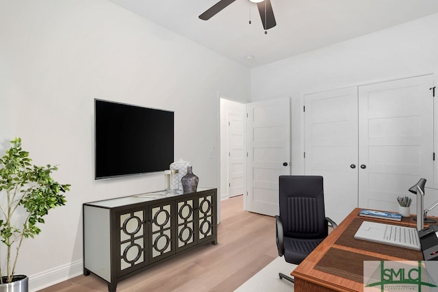 office space with ceiling fan and light hardwood / wood-style flooring