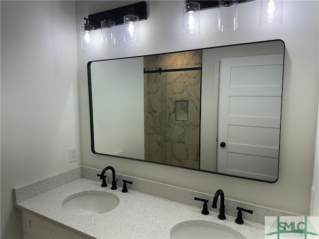 bathroom with vanity and an enclosed shower