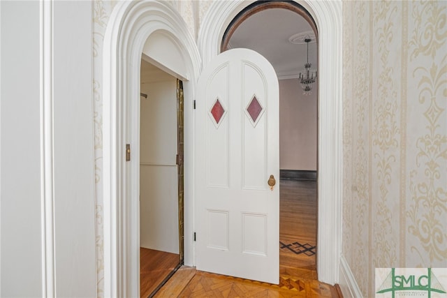 corridor with parquet flooring