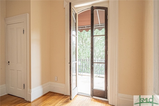 entryway with light hardwood / wood-style flooring