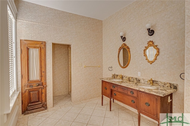 bathroom with vanity, tile walls, and tile patterned floors