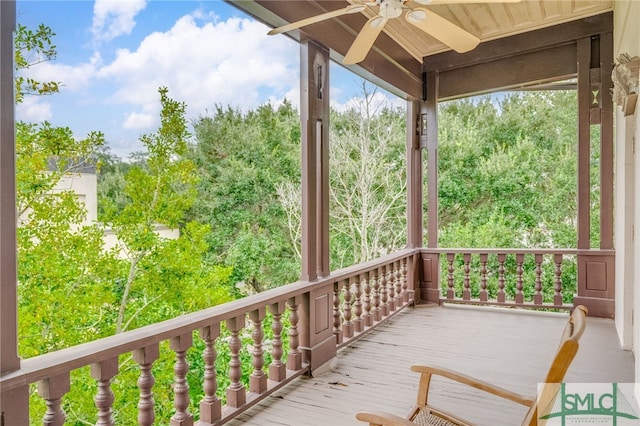 wooden deck with ceiling fan