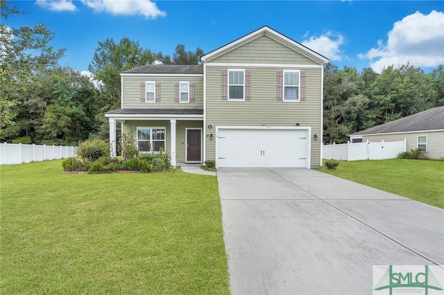 view of front of property featuring a garage and a front yard