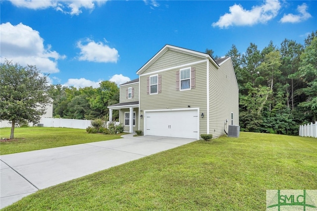 view of front of property featuring a garage and a front lawn