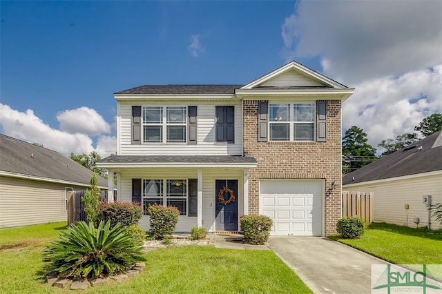 front of property featuring a front yard and a garage