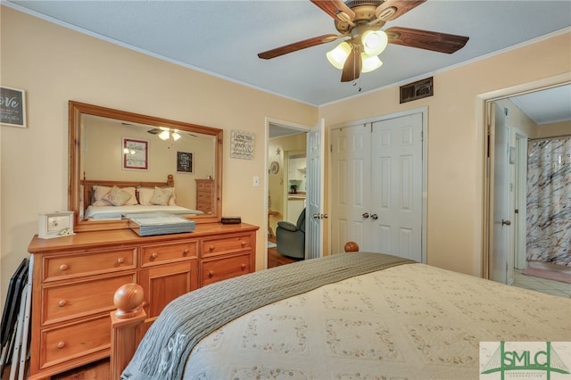 bedroom featuring ceiling fan, a closet, and ornamental molding