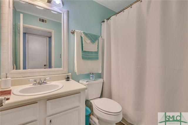 bathroom featuring a textured ceiling, walk in shower, vanity, and toilet