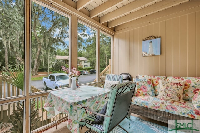 sunroom / solarium with beamed ceiling