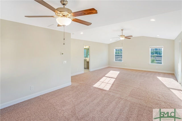 interior space with ceiling fan and vaulted ceiling