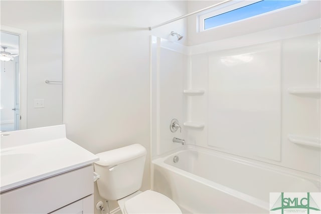 full bathroom featuring vanity,  shower combination, and toilet