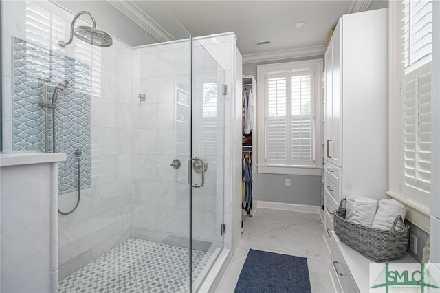 bathroom with ornamental molding and walk in shower