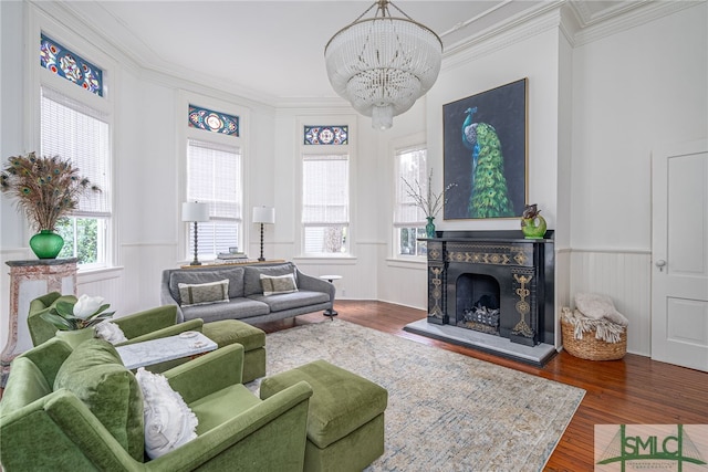 living room featuring plenty of natural light, dark wood-type flooring, and crown molding