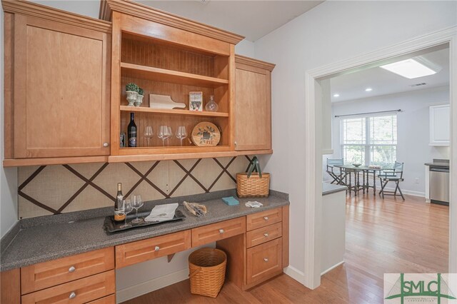 office with light hardwood / wood-style floors