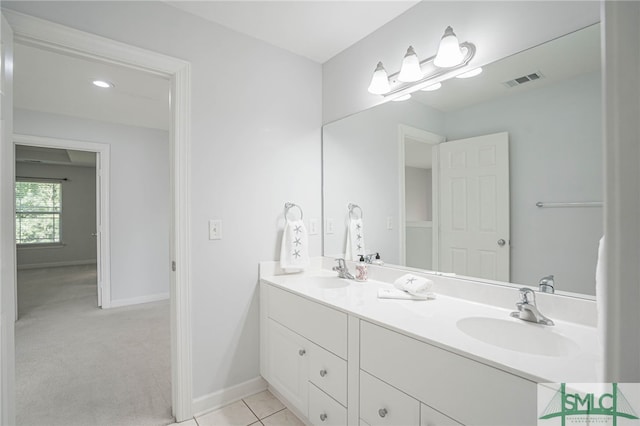 bathroom with vanity and tile patterned floors