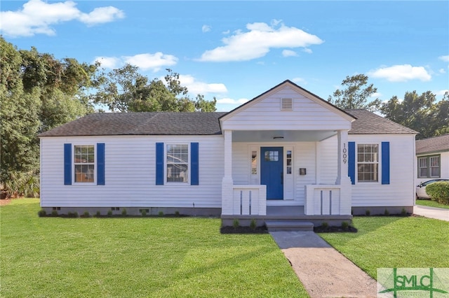 view of front of house featuring a porch and a front yard