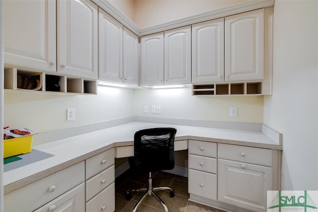 tiled office featuring built in desk