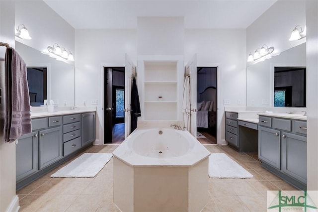401 River Oaks Dr, Richmond Hill, GA 31324 - full bath featuring tile patterned flooring, two vanities, a whirlpool tub, and built in features