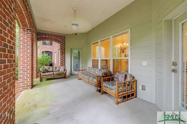 401 River Oaks Dr, Richmond Hill, GA 31324 - view of patio with an outdoor living space