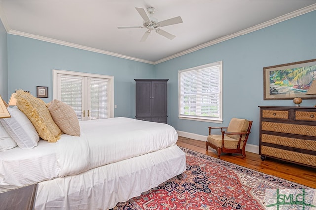 bedroom featuring ceiling fan, hardwood / wood-style flooring, and crown molding