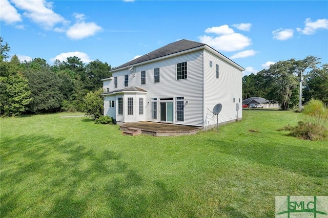 173 Trail Rd S, Midway, GA 31320 - back of property featuring a yard