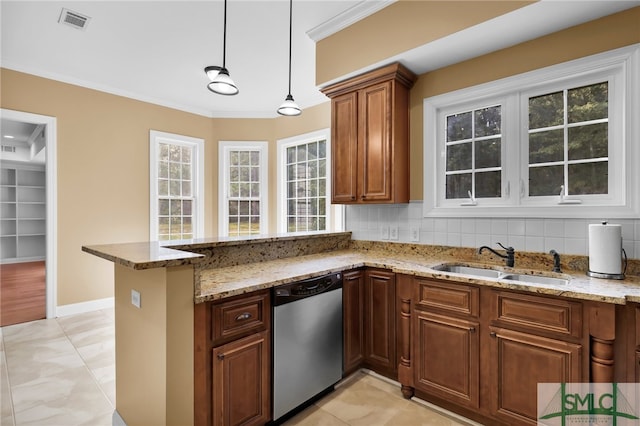 kitchen with ornamental molding, dishwasher, sink, and tasteful backsplash