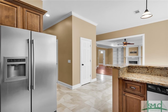 kitchen featuring light stone countertops, pendant lighting, crown molding, ceiling fan, and stainless steel refrigerator with ice dispenser