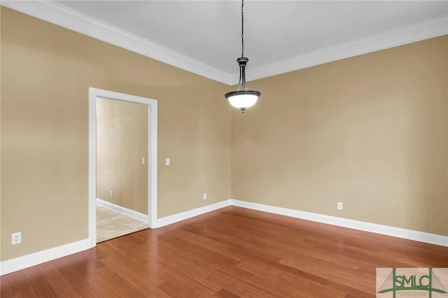 173 Trail Rd S, Midway, GA 31320 - spare room with baseboards, crown molding, and wood finished floors