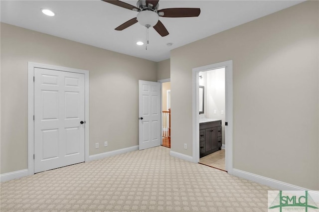 173 Trail Rd S, Midway, GA 31320 - unfurnished bedroom featuring ensuite bath, light carpet, baseboards, and recessed lighting