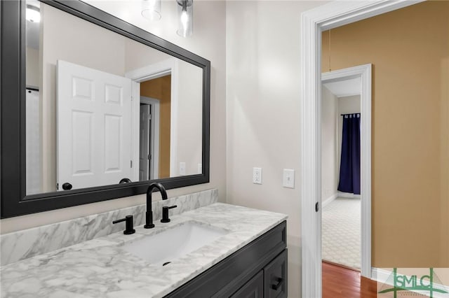 173 Trail Rd S, Midway, GA 31320 - bathroom with vanity and wood finished floors