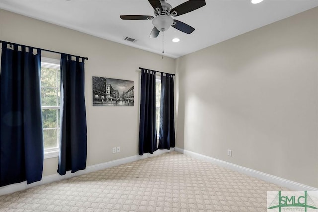 173 Trail Rd S, Midway, GA 31320 - unfurnished room featuring baseboards, recessed lighting, visible vents, ceiling fan, and carpet