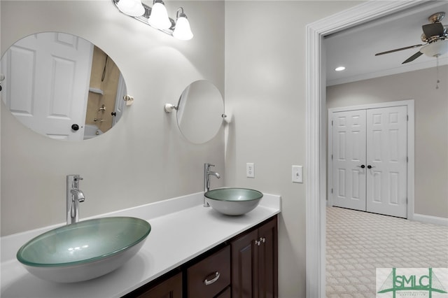 bathroom featuring ceiling fan and vanity