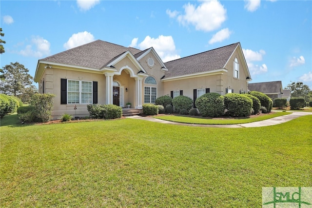 view of front of home with a front yard