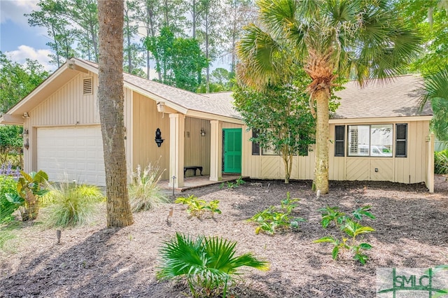 view of front of home with a garage