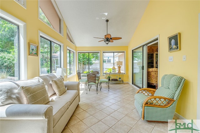 sunroom / solarium featuring vaulted ceiling and ceiling fan