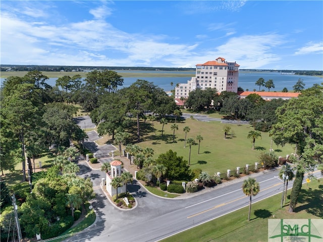 birds eye view of property with a water view