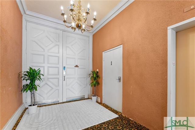 entryway featuring ornamental molding and a notable chandelier